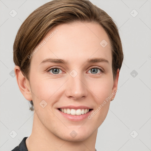 Joyful white young-adult female with short  brown hair and grey eyes