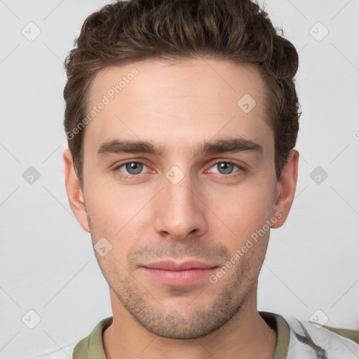 Neutral white young-adult male with short  brown hair and grey eyes