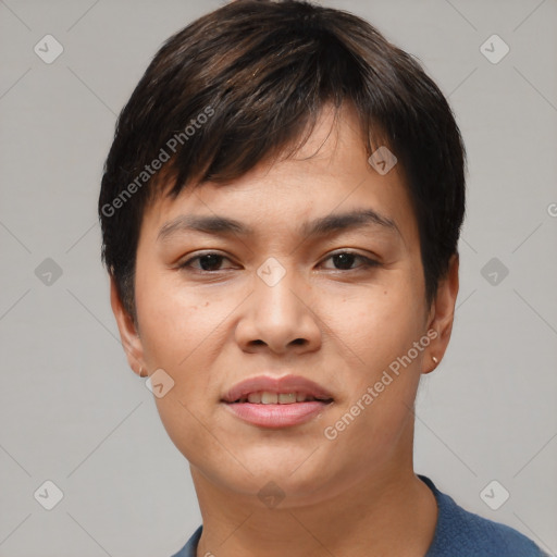 Joyful asian young-adult female with short  brown hair and brown eyes