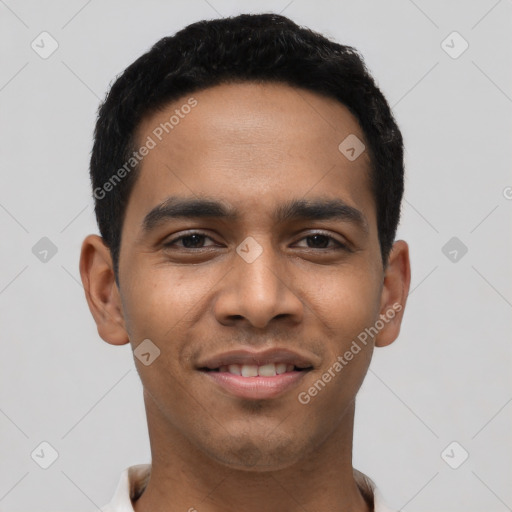 Joyful latino young-adult male with short  black hair and brown eyes