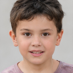 Joyful white child male with short  brown hair and brown eyes