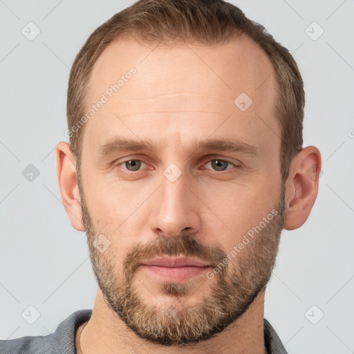 Neutral white adult male with short  brown hair and brown eyes