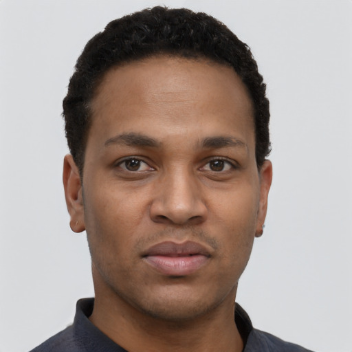 Neutral black young-adult male with short  black hair and brown eyes