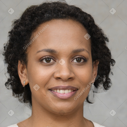 Joyful black young-adult female with medium  brown hair and brown eyes