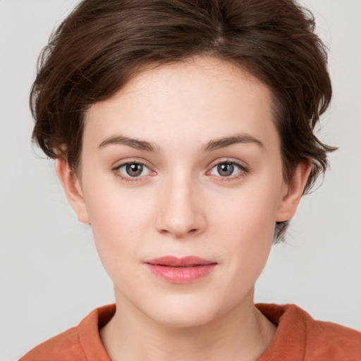 Neutral white young-adult female with short  brown hair and brown eyes