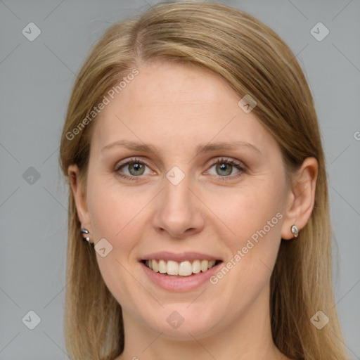 Joyful white young-adult female with long  brown hair and grey eyes