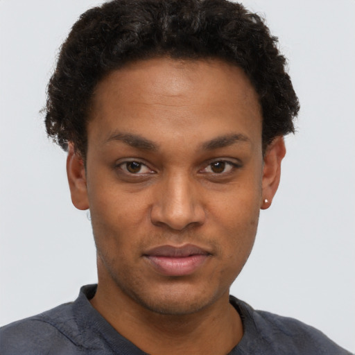 Neutral black young-adult male with short  brown hair and brown eyes