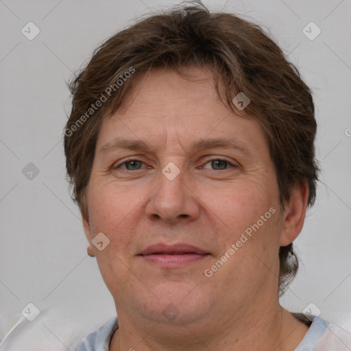 Joyful white adult female with short  brown hair and brown eyes