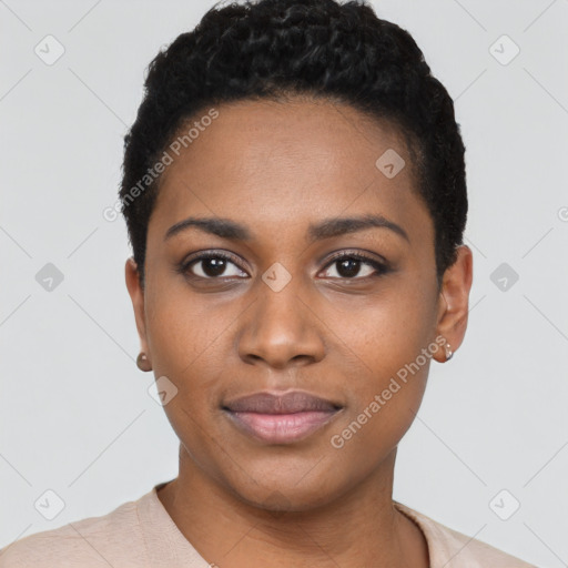 Joyful black young-adult female with short  black hair and brown eyes