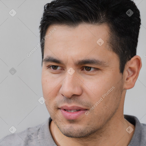 Joyful white young-adult male with short  black hair and brown eyes