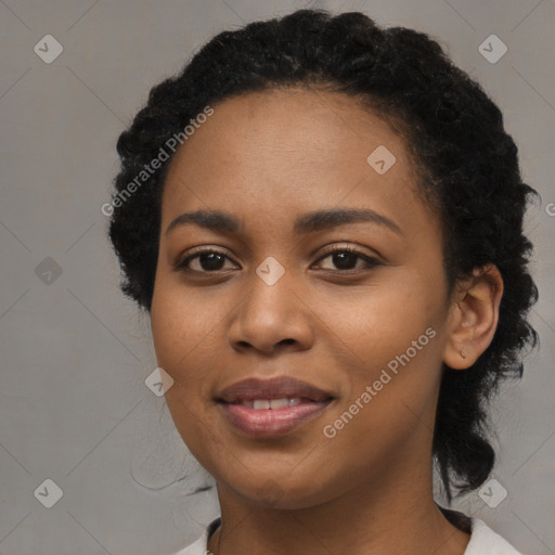 Joyful black young-adult female with medium  black hair and brown eyes