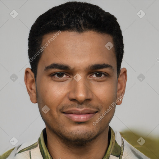 Joyful black young-adult male with short  black hair and brown eyes