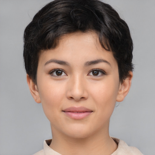 Joyful asian young-adult female with short  brown hair and brown eyes