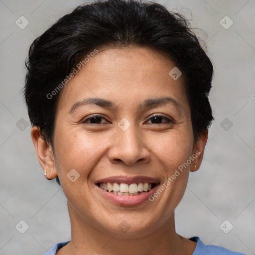 Joyful white adult female with short  brown hair and brown eyes