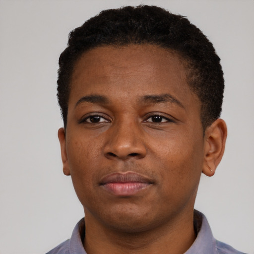 Neutral black young-adult male with short  brown hair and brown eyes