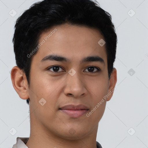 Joyful latino young-adult male with short  brown hair and brown eyes