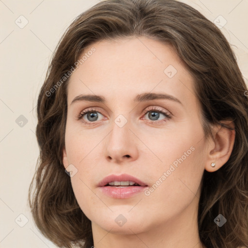 Neutral white young-adult female with long  brown hair and green eyes