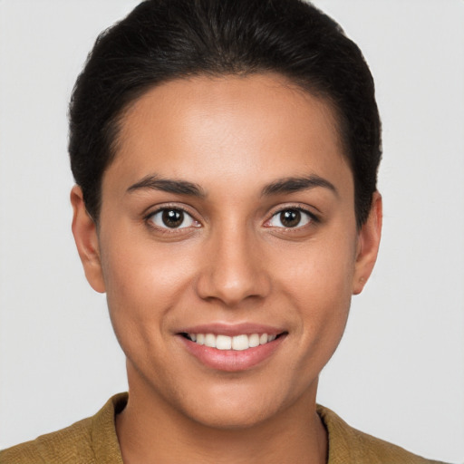 Joyful white young-adult female with short  brown hair and brown eyes