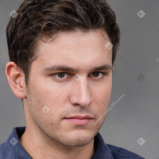 Neutral white young-adult male with short  brown hair and grey eyes