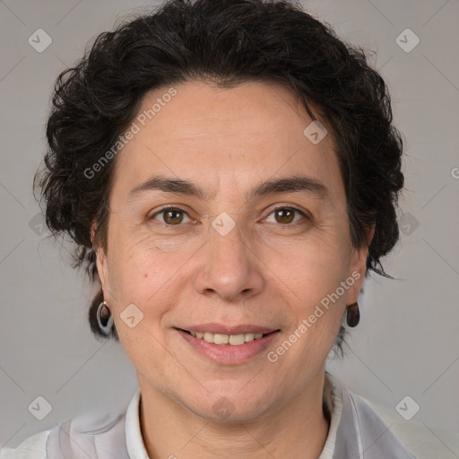 Joyful white adult female with short  brown hair and brown eyes