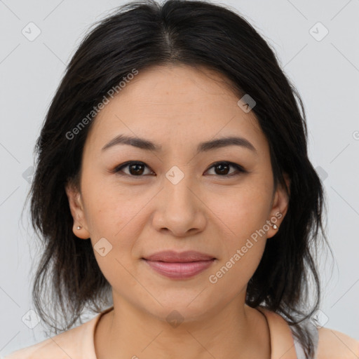 Joyful asian young-adult female with medium  brown hair and brown eyes