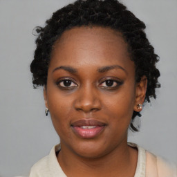 Neutral black young-adult female with short  black hair and brown eyes