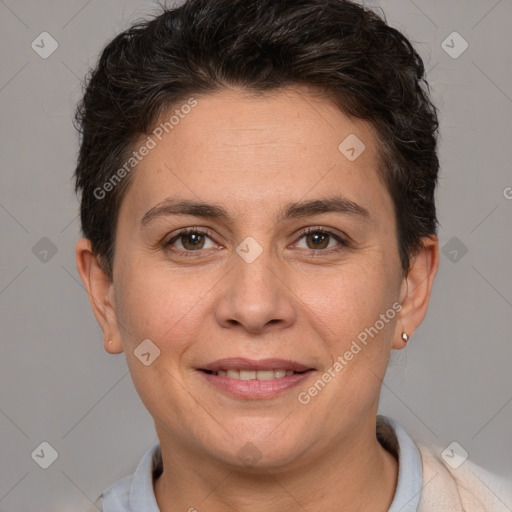 Joyful white adult female with short  brown hair and brown eyes