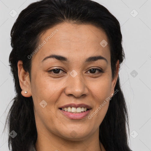 Joyful latino young-adult female with long  brown hair and brown eyes