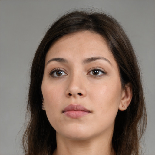 Neutral white young-adult female with medium  brown hair and brown eyes