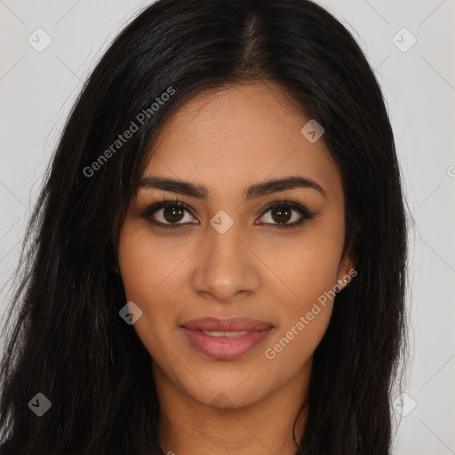 Joyful latino young-adult female with long  brown hair and brown eyes