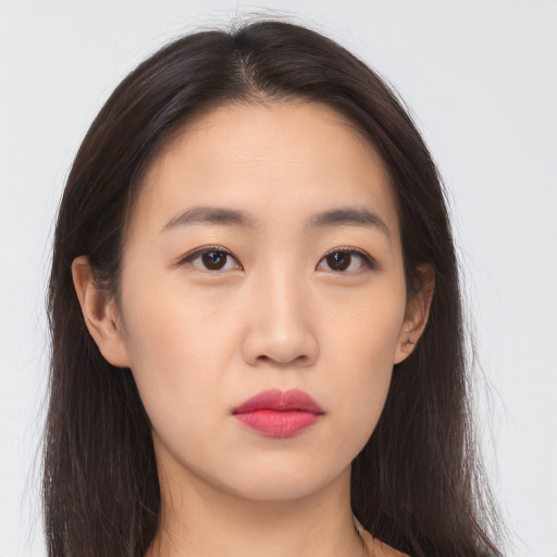 Neutral asian young-adult female with long  brown hair and brown eyes