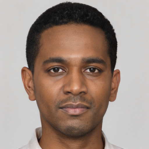 Neutral black young-adult male with short  black hair and brown eyes