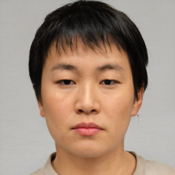 Neutral asian young-adult male with short  brown hair and brown eyes