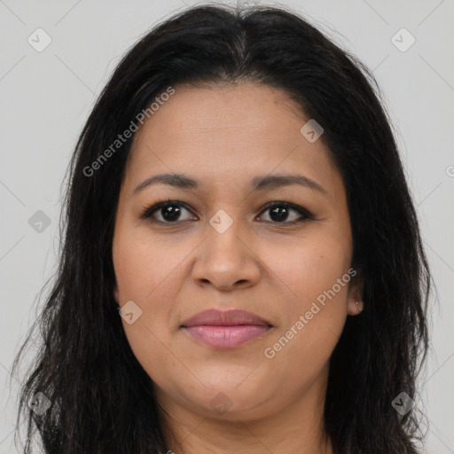 Joyful latino young-adult female with long  brown hair and brown eyes