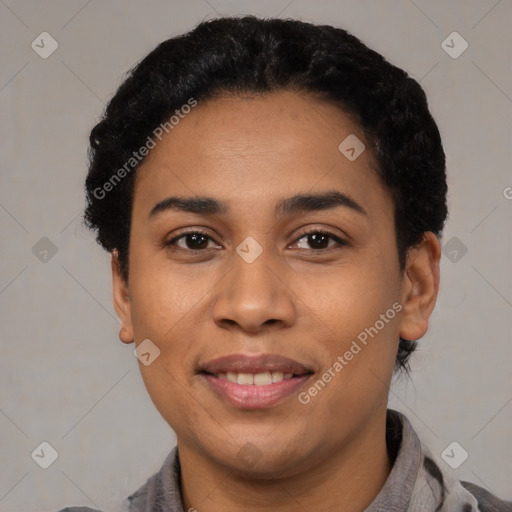 Joyful latino young-adult female with short  black hair and brown eyes