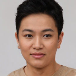 Joyful asian young-adult female with short  black hair and brown eyes