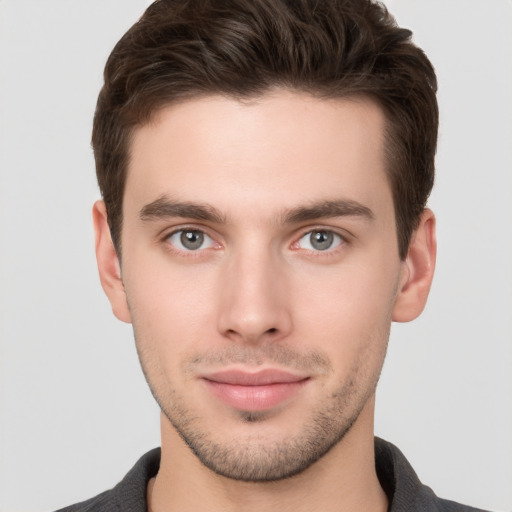 Neutral white young-adult male with short  brown hair and brown eyes