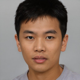 Neutral asian young-adult male with short  brown hair and brown eyes