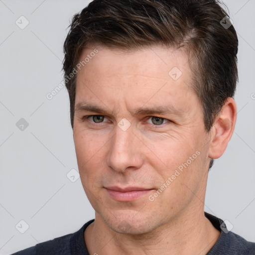 Neutral white adult male with short  brown hair and brown eyes