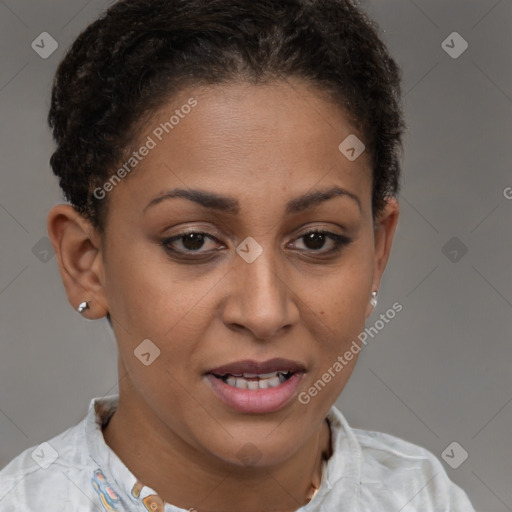 Joyful latino young-adult female with short  brown hair and brown eyes