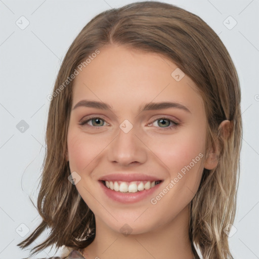 Joyful white young-adult female with medium  brown hair and green eyes