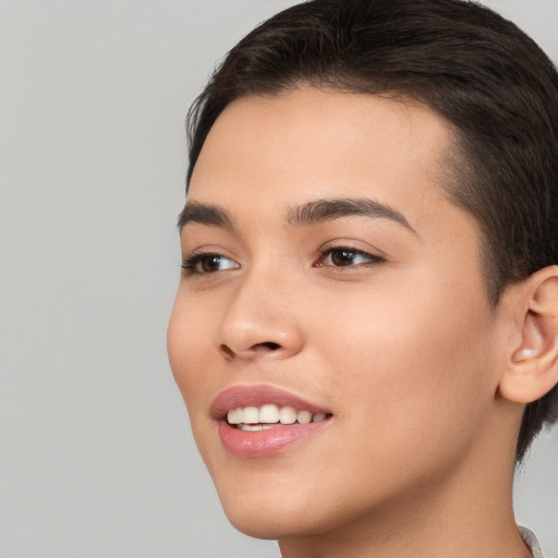 Joyful white young-adult female with short  brown hair and brown eyes