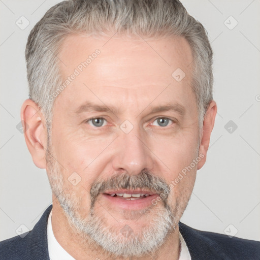 Neutral white middle-aged male with short  gray hair and brown eyes