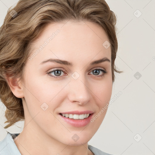 Joyful white young-adult female with medium  brown hair and blue eyes