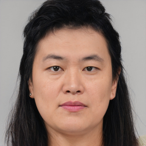 Neutral asian young-adult female with long  brown hair and brown eyes