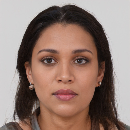 Neutral white young-adult female with long  brown hair and brown eyes