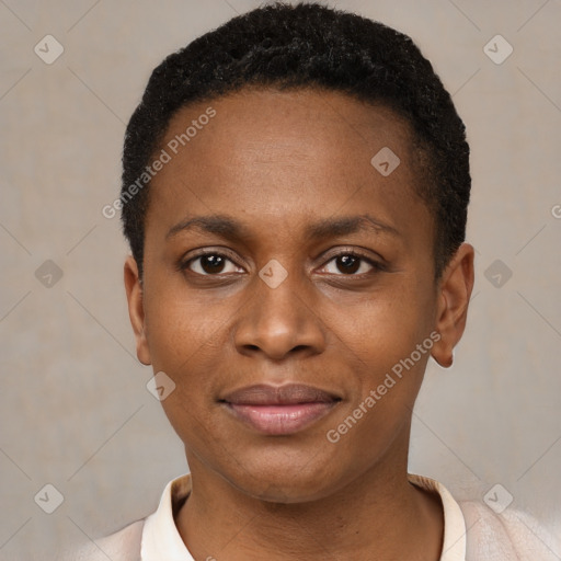 Joyful black young-adult female with short  black hair and brown eyes