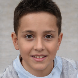 Joyful white child male with short  brown hair and brown eyes