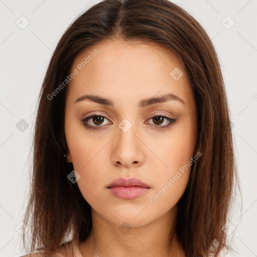 Neutral white young-adult female with long  brown hair and brown eyes