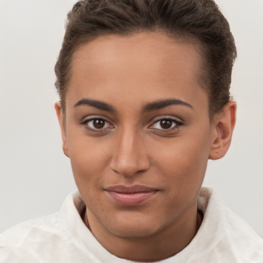 Joyful white young-adult female with short  brown hair and brown eyes